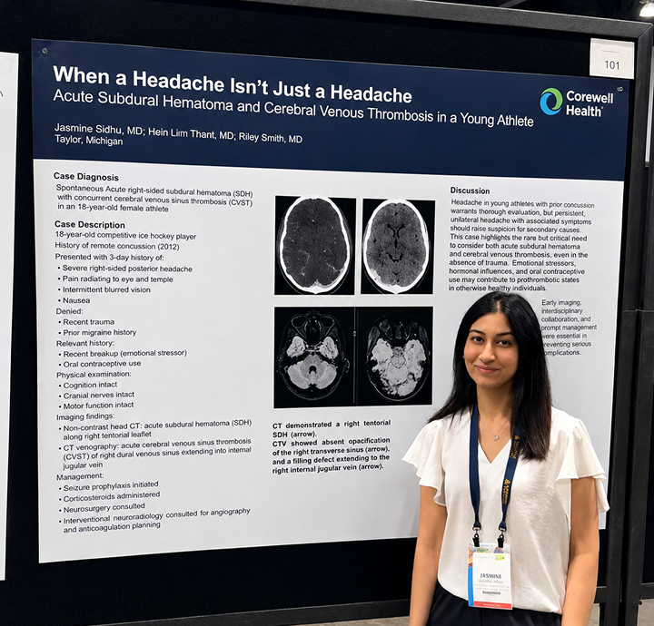 Research presenter standing beside a medical conference poster titled ‘When a Headache Isn’t Just a Headache’ with brain scan images and case study findings.