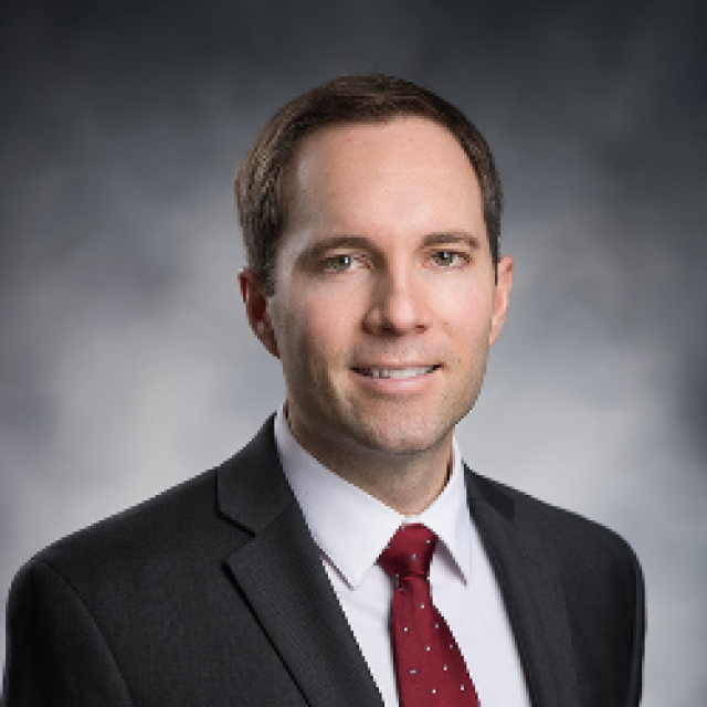 Portrait of Travis Menge, MD