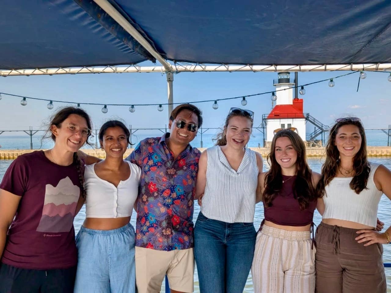 Group of residents on a boat out on the lake