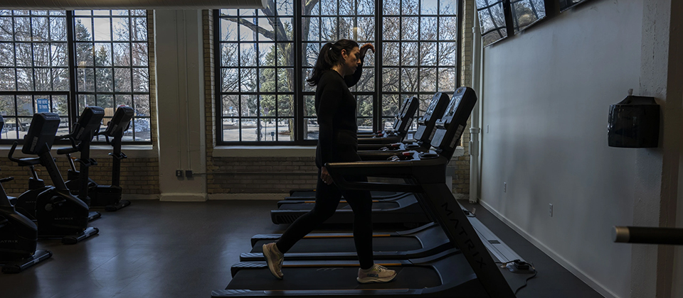 Lauren trains on a treadmill for the Reeds Lake Resolution Run.