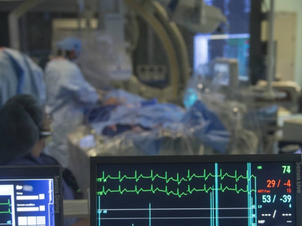 Monitoring the patient stats during surgery.