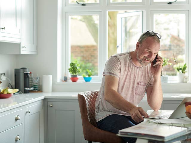 Man talking on mobile phone.