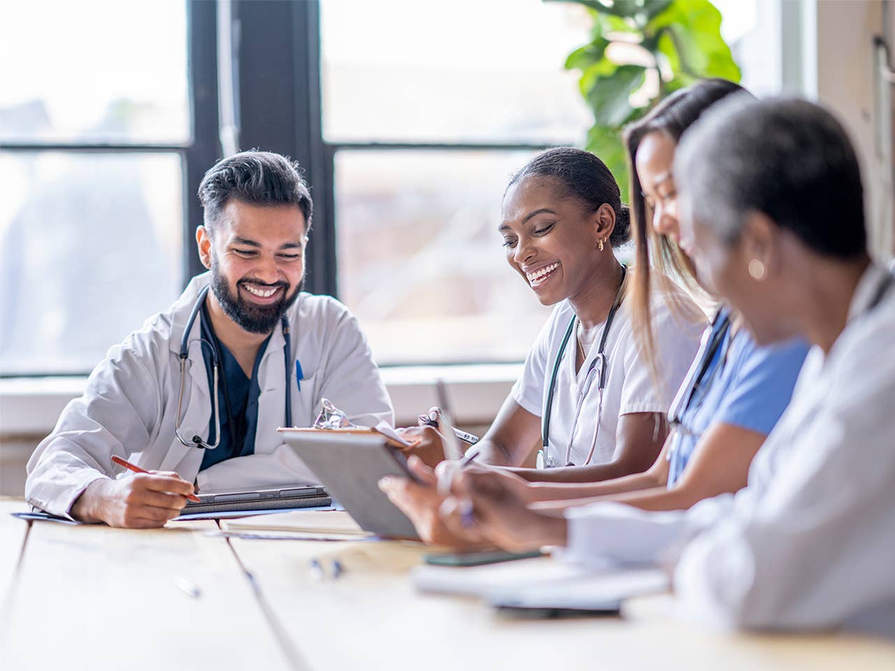 Group of graduate medical education residents and fellows at Corewell Health