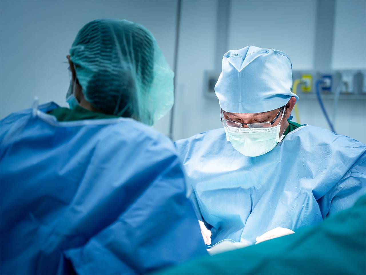 Doctor and medical staff in a surgery room performing a surgery
