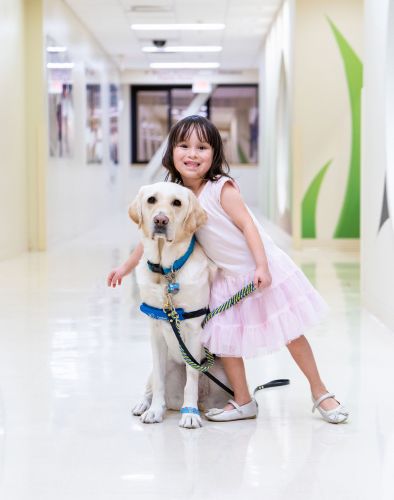 young female patient with therapy dog