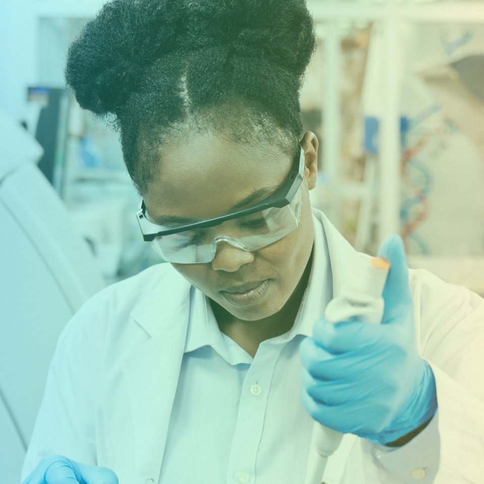 Female scientist running tests