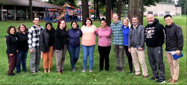 Hospice and Palliative Medicine Fellows at a retreat at The Cottage on Lake Michigan