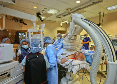 Photo of cardiologists in an operation room in the middle of a surgery