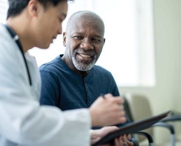 Doctor talking to patient