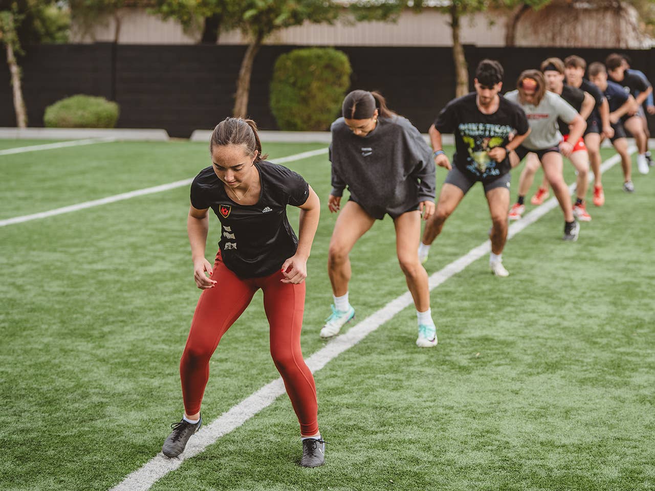 A group of young individuals training at the Corewell Health Sports Performance Center.