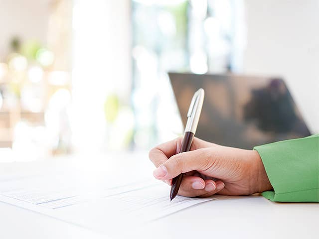 Person with pen