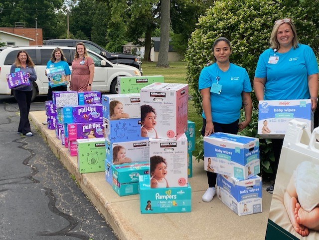 Volunteers at free diaper distribution