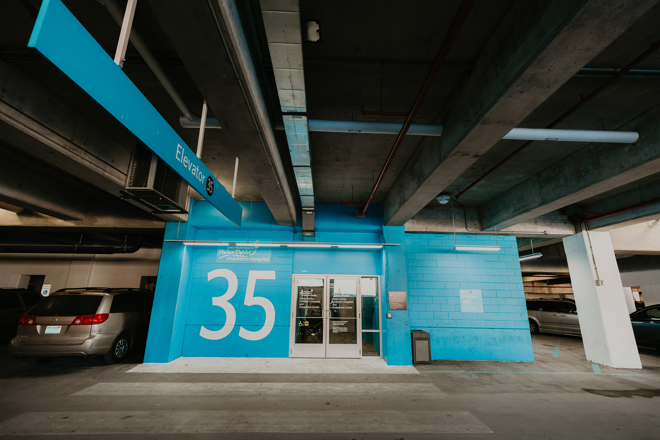 Blue elevator bank in the 35 Michigan Street parking garage