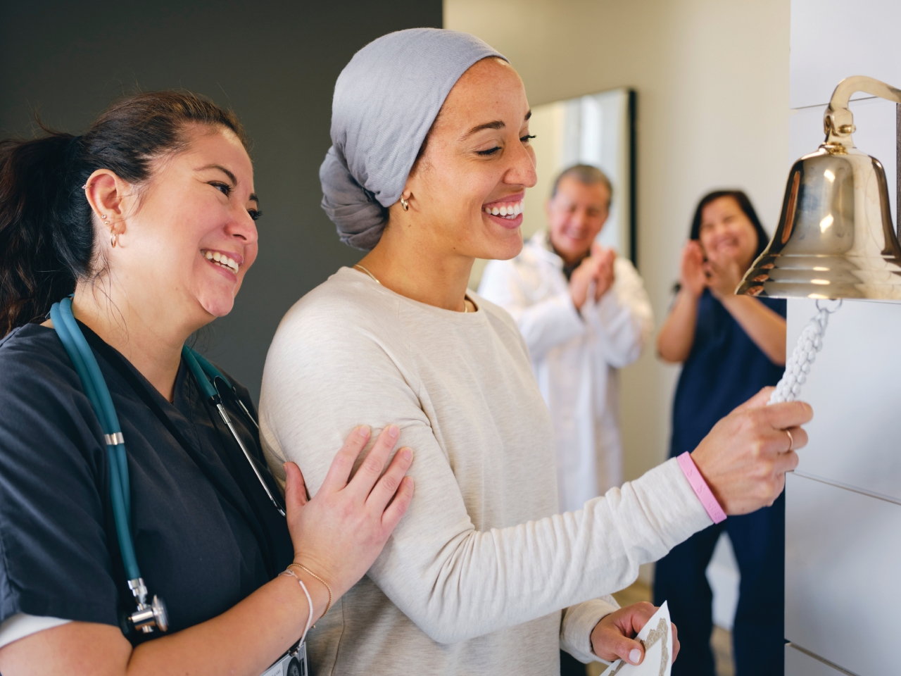 Patient ringing the cancer bell