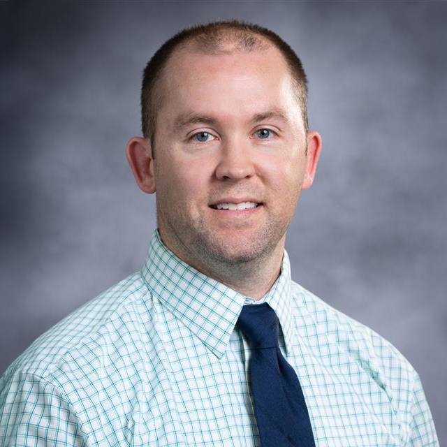 Portrait of Christopher Currie.