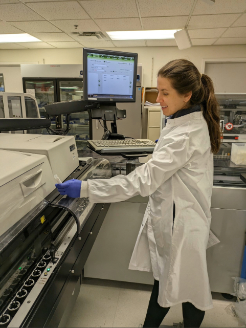 Female medical student working with a female staff technologist on testing something