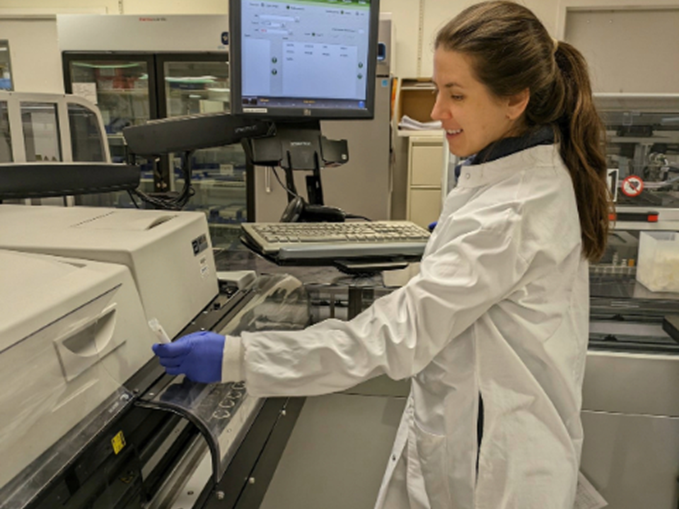 Female medical student working with a female staff technologist on testing something