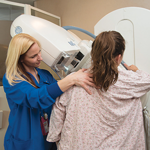 Xray tech performing a mammography