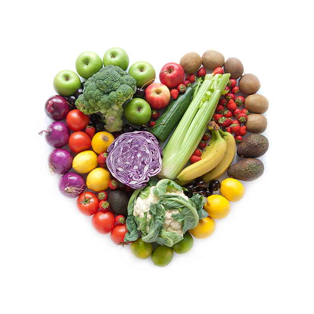 A red heart alongside a stethoscope, set against a white background, symbolizing health and care.