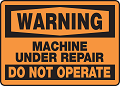 Placa de aviso que significa máquina em manutenção