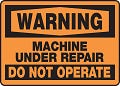Placa de aviso que significa máquina em manutenção