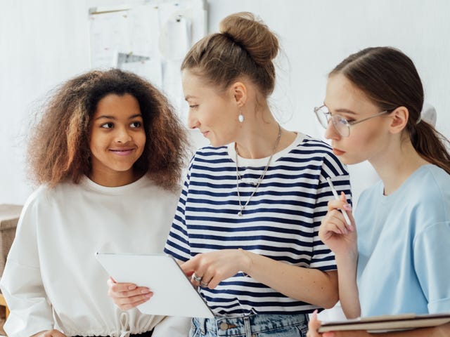 Teenage girls with their instructor during a summer camp