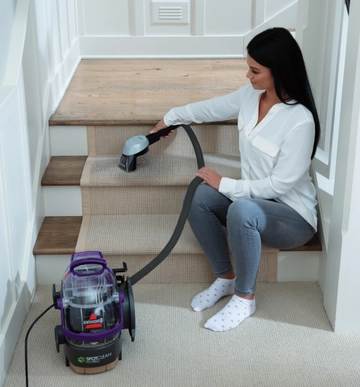 Using SpotClean Pet Pro carpet cleaner to deep clean stairs.