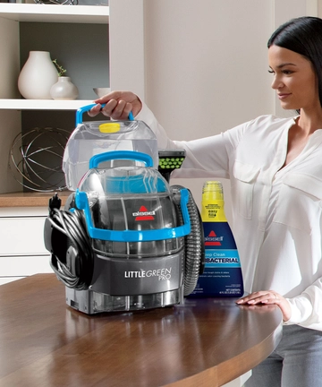 Pulling Clean Water Tank out of Little Green Pet Pro Portable Carpet Cleaner.