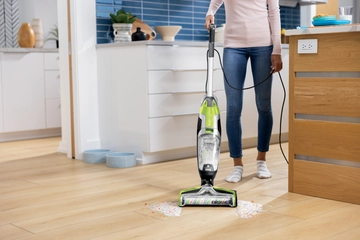 CrossWave Wet Dry Vac cleaning area rug moving to hard flooring.