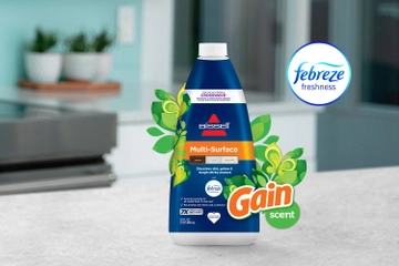 Bottle of Multi-Surface Formula with Febreze Scent with Gain Logo