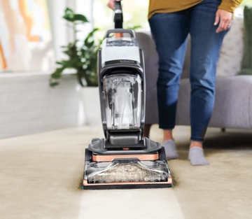Revolution HydroSteam Carpet Cleaner deep cleaning dirty carpet.