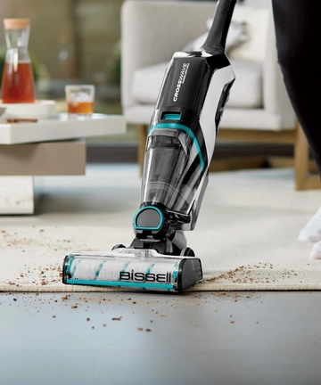 CrossWave Cordless Max Multi-Surface Wet Dry Vac switching from area rug to hard flooring