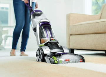 ProHeat 2X Revolution Pet Pro Carpet Cleaner cleaning dirt from carpet.
