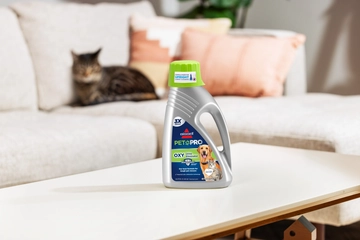 Bottle of PET PRO OXY Urine Eliminator Formula sitting on table. 