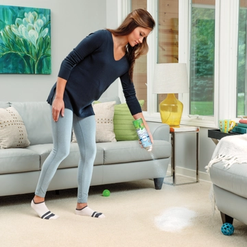 Febreze Gain Original Heavy Traffic Carpet Foam being sprayed onto carpet.