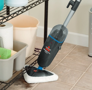 Steam Mop Select Mopping mess off tile flooring
