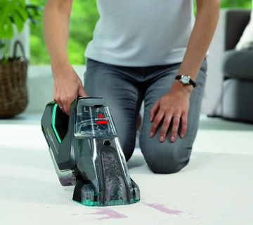 Pet Stain Eraser PowerBrush cleaning stain off carpet.