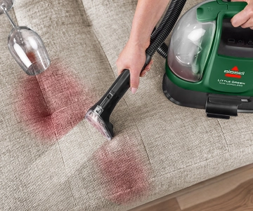 Little Green Mini cleaning dirty stair carpet