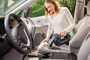 Pet Stain Eraser cleaning mess off car seat upholstery.