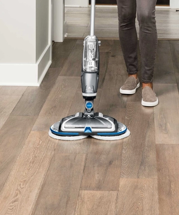 SpinWave Cordless Spin Mop mopping hard flooring.