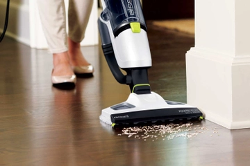vacuum and mopping dry spill from hard flooring