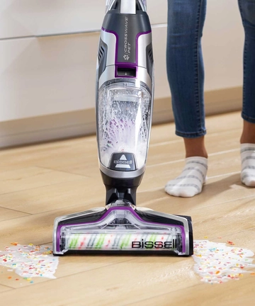 CrossWave Pet Pro Wet Dry Vac Vacuuming and Mopping spilled milk and cereal from hard flooring. 