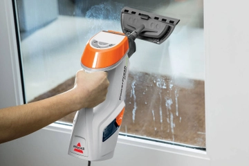 Using PowerFresh Lift Off Steamer with attachment to clean windows