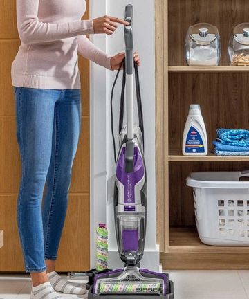 Button on Handle of CrossWave Pet Pro Wet Dry Vac to control spray.
