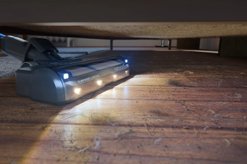 PowerClean FurFinder vacuuming pet hair and dirt from under furniture
