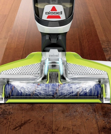 Brush Roll mopping and picking up debris from hard flooring