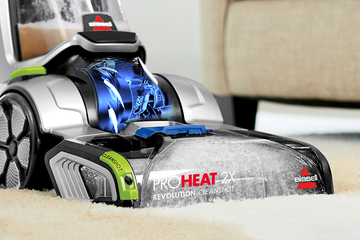 ProHeat 2X Revolution Pet Pro Carpet Cleaner cleaning dirt from carpet.