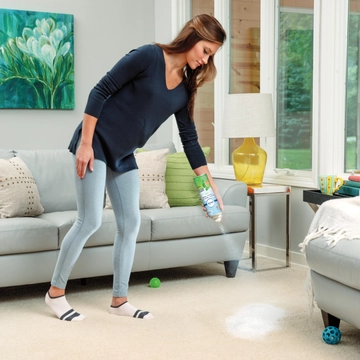 Febreze Gain Heavy Traffic Carpet Foam being sprayed onto carpet.