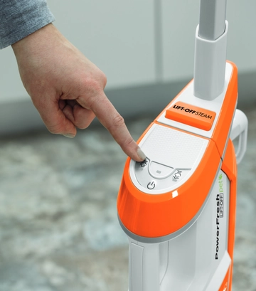 Choosing steam modes on the PowerFresh Pet Lift-Off 2-in-1 Steam Mop