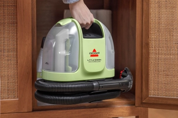 Storing Little Green Mini in cupboard